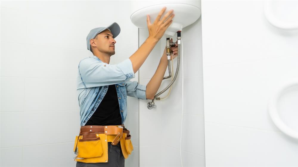 Electric water heater installation in bathroom